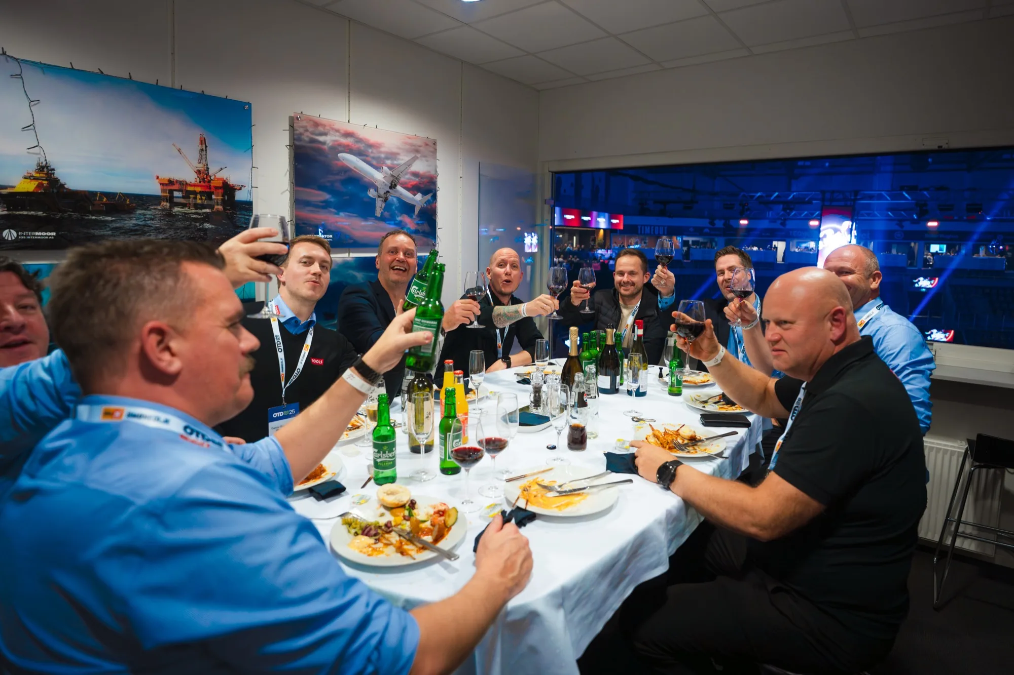 Guests toasting in a VIP executive box at the OTD Energyshow 2025
