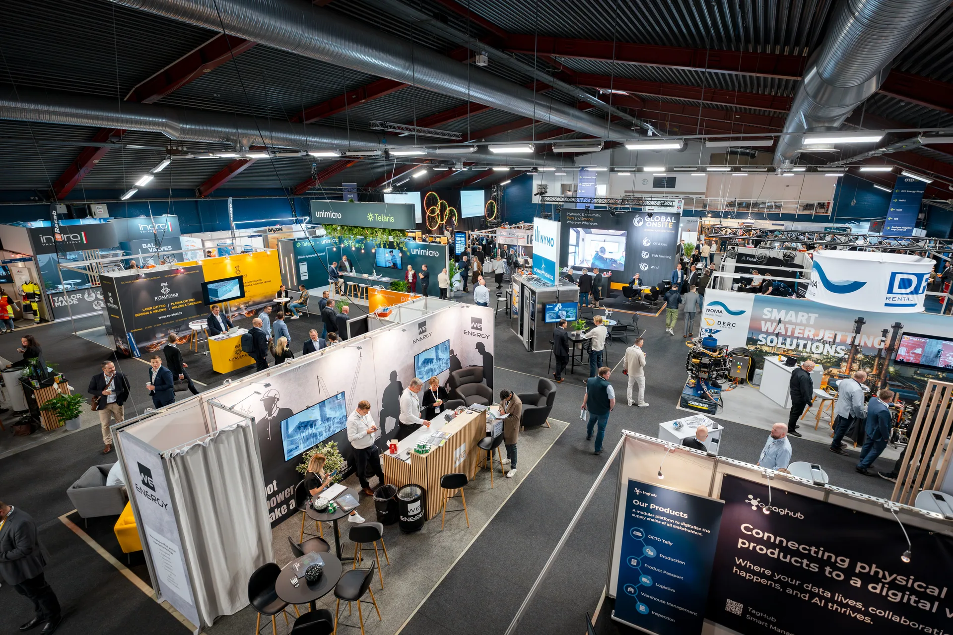 Wide view of the OTD Energy 2025 exhibition floor with multiple exhibitor stands